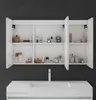 A white bathroom vanity with an open mirrored cabinet above it, filled with various toiletries and cosmetic products. Produktbild-Vorschau