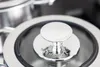 Close-up of a stainless steel pot lid with a handle. Produktbild-Vorschau