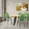 A dining room scene with a wooden table and green chairs. Náhled obrázku produktu