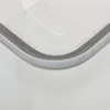 Close-up of the edge of a clear plastic storage box lid with a gray rubber seal. Podgląd zdjęcia produktu