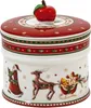 A Christmas-themed ceramic cookie jar with a lid topped by a red apple. Anteprima dell’immagine prodotto