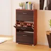 A shoe cabinet with multiple compartments and shelves, filled with shoes and books, placed in a room. Produktbild-Vorschau