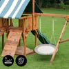 A wooden playground set with a slide and a nest swing, set on a green lawn. Produktbild-Vorschau