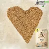 A heart shape made of birdseed with a bag of birdseed in the lower right corner. Produktbild-Vorschau