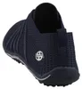 Auf dem Bild ist ein flacher Schuh in der Farbe Blau zu sehen der aus einer Kombination von Textil und Leder gefertigt zu sein scheint. Der Schuh wird von der Seite präsentiert und hebt die schlanke Silhouette sowie die Details des Designs hervor. Produktbild-Vorschau