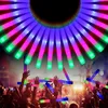 A crowd of people at a concert or event, holding up glowing LED foam sticks. Náhled obrázku produktu