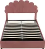 A pink upholstered bed frame with a slatted base, shown from a front-facing angle against a white background. Náhľad obrázku produktu