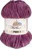 A ball of purple yarn with a label. Produktbild-Vorschau