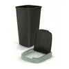 A black trash can with a detached green lid and base, shown against a white background. Anteprima dell’immagine prodotto