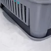 Close-up of a gray plastic dish drying rack with a drip tray. Produktbild-Vorschau