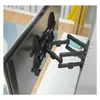 A TV wall mount is attached to the back of a television, which is angled away from the viewer. Podgląd zdjęcia produktu