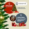 A festive Christmas marketing image featuring a decorated Christmas tree, gift boxes, and a child decorating the tree. Produktbild-Vorschau