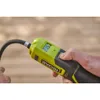 A hand holding a Ryobi air compressor with a digital display showing '21.5'. Produktbild-Vorschau