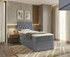 A bedroom scene featuring a boxspring bed. Náhled obrázku produktu