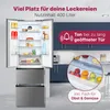 A refrigerator with its doors open, showcasing its interior and contents, with marketing text overlays and a close-up inset of fruit and vegetables. Produktbild-Vorschau