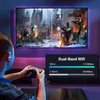 A person playing a video game on a TV with ambient lighting. Produktbild-Vorschau