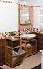 A bathroom scene featuring wooden storage units and a sink. Produktbild-Vorschau