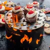Steak dishes are being cooked on a grill with a decorative metal insert. Produktbild-Vorschau