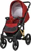 A red and black baby stroller shown from the front-diagonal angle against a white background. Náhled obrázku produktu