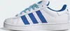 A side view of a white Adidas sneaker with blue accents. Podgląd zdjęcia produktu