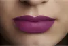 Close-up of a person's lips wearing purple lipstick. Náhled obrázku produktu