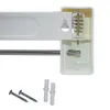 A white retractable clothes dryer mounted on a wall, with screws and wall plugs in the foreground. Anteprima dell’immagine prodotto