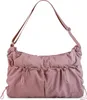 A studio shot of a pink handbag. Anteprima dell’immagine prodotto