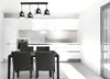 A modern kitchen and dining area with a pendant light fixture above a table. Produktbild-Vorschau