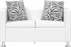 A white sofa with two zebra-print cushions. Anteprima dell’immagine prodotto