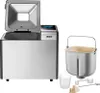 Der Brotbackautomat Unold Backmeister® Top Edition steht auf einer weißen Fläche, umgeben von Mehl,  Produktbild-Vorschau