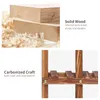A split image showing raw wood planks and sawdust on the top, and a close-up of wooden shelf supports on the bottom. Anteprima dell’immagine prodotto
