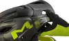 A close-up shot of a black and camouflage MET full-face helmet with a hand wearing a neon green glove adjusting the visor. Voir les images du produit