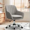 A gray office chair with wheels is shown in a room with blinds in the background. Produktbild-Vorschau