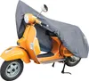 An orange scooter partially covered by a gray tarp. Náhľad obrázku produktu