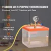 A vacuum chamber with a pressure gauge and hose, set against a gray background with text overlays. Anteprima dell’immagine prodotto