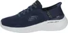 A side view of a navy blue Skechers slip-on sneaker with a white sole. Náhľad obrázku produktu