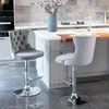 Two gray velvet bar stools in a modern kitchen setting. Produktbild-Vorschau