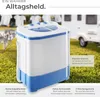 A mini washing machine is shown outdoors on grass, with a caravan and clothesline in the background. Produktbild-Vorschau