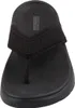 Auf dem Bild ist eine schwarze Sandale zu sehen die seitlich abgebildet ist. Die Sandale hat ein schlichtes Design mit einem verstellbaren Riemen und einer offenen Zehenpartie. Produktbild-Vorschau