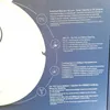 Marketing material showing features of a robot vacuum cleaner. Voir les images du produit