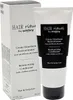 A box and tube of Sisley Hair Rituel Restructuring Conditioner. Produktbild-Vorschau