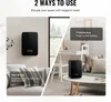 A split image showing two ways to use a black diffuser: wall-mounted in a living room and freestanding on a coffee table in a living room. Produktbild-Vorschau