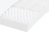 A close-up, angled view of a white foam mattress cut to reveal its layered structure. Produktbild-Vorschau