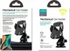 Two product packages for a mechanical car holder are shown side-by-side. Produktbild-Vorschau