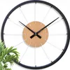 A modern wall clock with a bicycle wheel design. Produktbild-Vorschau