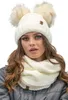 A woman wearing a winter hat and scarf. Produktbild-Vorschau