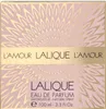The image shows the front of a perfume box with a floral pattern. Voir les images du produit