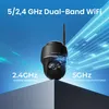 A black security camera is shown against a blue background with streaks of light, illustrating dual-band WiFi capabilities. Produktbild-Vorschau