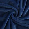 A close-up, swirling view of dark blue plush fabric. Produktbild-Vorschau