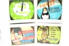 A collage of four round clocks with humorous German sayings and cartoon illustrations. Produktbild-Vorschau
